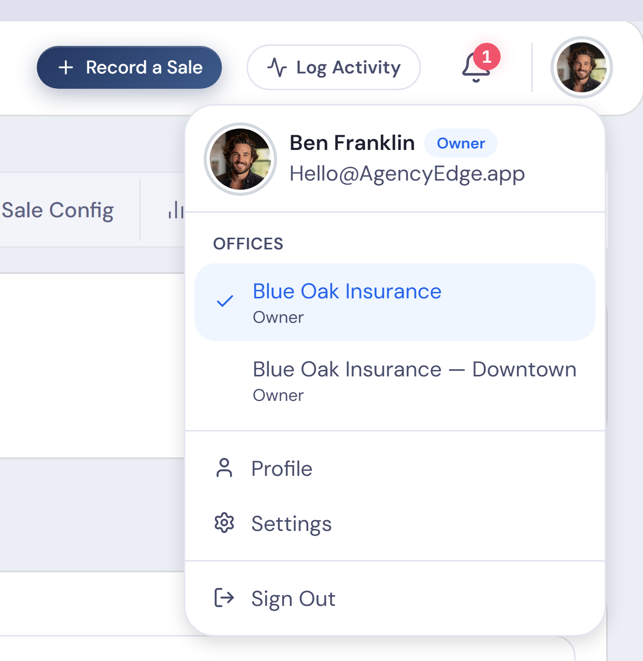 The account menu, open: two offices under one login, with the one in view ticked.